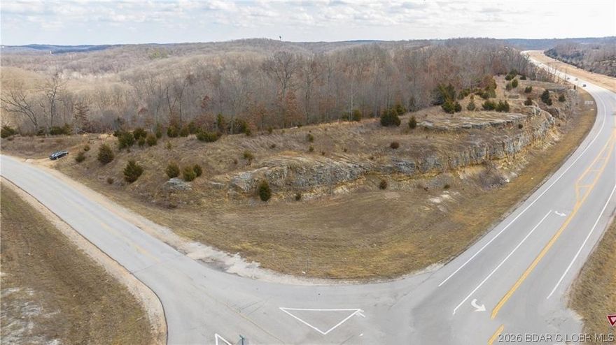 Endless possibilities await with this outstanding 23.7-acre corner lot located just minutes north of Camdenton and less than 1 mile south of the Niangua Bridge. This magnificent acreage boasts over 1,600 feet of highway frontage and an additional 700 feet of frontage on Harvest Road. With high traffic counts and excellent visibility from the highway, this B-2 zoned property is a perfect fit for almost any business venture.