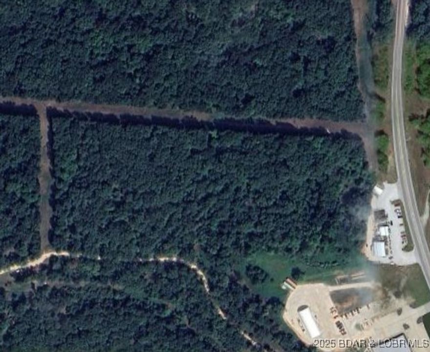 Over 5 acres with Highway frontage off State Hwy 5 in Sunrise Beach. Conveniently located approximately 1/10 mi north of the intersection of Hwy 5 and F Rd, this acreage is not currently zoned and is ready for your development dreams. No water, sewer, but electric runs along the north of the parcel, and CoMo Electric office is only 2 lots away, so it should be an easy hookup for electricity.