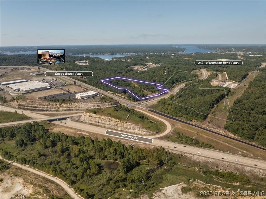 Nearly 8 acres of commercially zoned land right on the corner of Hwy 242 and Osage Beach Parkway.  Property offers so much potential as it is in the City of Lake Ozark Tif district. Great visibility as you enter Lake of the Ozarks. Nearly 1,400 feet of highway frontage directly across from the Movie Theater. Water and sewer in close proximity making the extension of the infrastructure more easily available. Only minutes away from The Bagnell Dam Strip and seconds away from Menards, Kohls, Casey's and everything yet to be built on Hwy 242. With this visibility and the Tif viability this property is a great development piece.  Even more interesting is the fact that this property abuts the proposed Osage Nation Casino.