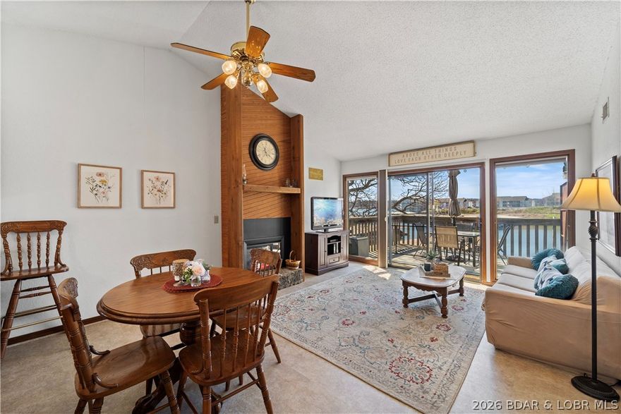 Fantastic find in Southwood Shores Condo Complex! Top floor, waterfront condo that comes turn-key with a boat slip and lift. This is an end unit which gives you better views and an extra window. Vaulted ceilings and open floor plan. Lots of windows make it nice and bright. Easy walk to your dock and close to the pool. This is a gated complex with hot tub, indoor and outdoor pools, clubhouse, tennis and basketball courts, trailer parking, boat ramp, and playground. Would make an excellent nightly rental or keep this one for yourself. Located on the 12 mile marker. New water heater in January 2026. Under contract taking back up offers through contingencies.