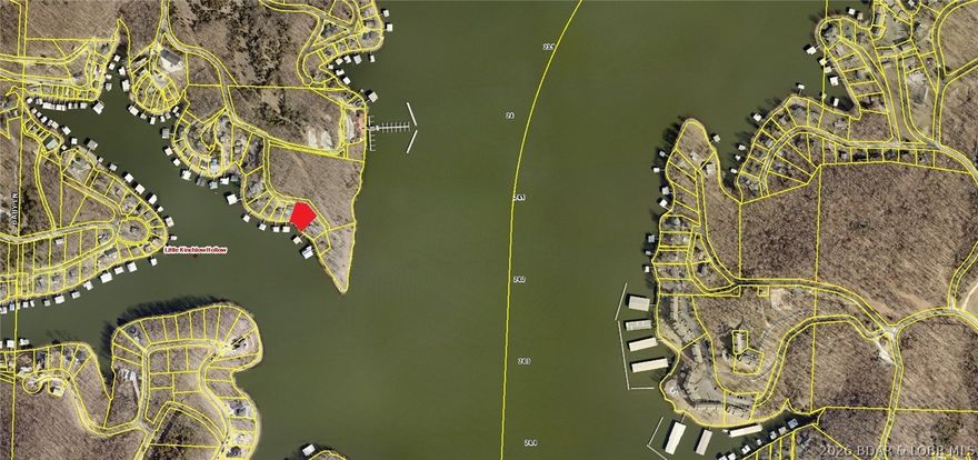 LAKE OF THE OZARKS - A very short walk to Paradise. Awesome dockable lot at the 24MM that, as shown, accommodates a dock with a 14x40 slip and a 12x12 PWC slip. Great central location at the 24 mile mark off TT on Shawnee Bend. The Road to Paradise is Paved with...Concrete. No gravel to lot.