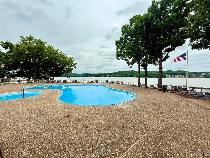 Lake life is easy at Bay Point Village #625, a furnished end-unit condo with panoramic 24 MM views and some of the best sunsets at Lake of the Ozarks. This 2 bed, 2 bath condo offers a bright, modern lake-style feel, a covered deck, newer floor-to-ceiling primary bedroom windows, and a view of the included 10x24 boat slip right from the condo. Privately enjoyed and beautifully kept, this one-level unit offers convenience with minimal steps to door and dock. Inside the condo comes furnished to make it easier to immediately start enjoying your summers. This well cared for complex features 2 pools with amazing views, clubhouse, playground, boat trailer parking, additional storage, and a tornado shelter. Perfectly located for easy access by land and water, this low-maintenance condo is ideal as a weekend getaway, full-time home, or rental investment. Low assessments make it even better.  Come take a look and get your summer started in this furnished lakefront condo.