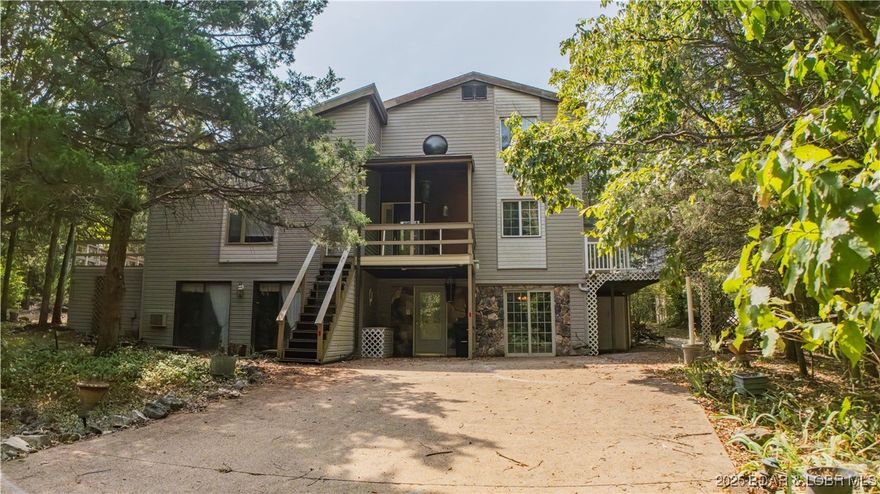 A spacious 3BR\3BA home with 2-car detached garage, full finished walk-out basement, all nestled on 2.8 acres +\-. No one room is the same, with different styles of wall-coverings, flooring designs and variations of wood throughout. Custom-built kitchen cabinets. Lots of additional space in the home for an office or make into additional bedroom space. Walk-in pantry. Bathroom on each level. Heating and cooling can be controlled in each room. Covered decks surround the home with many walkways to easily get around. An above ground pool, hot-tub and two gazebos, just to name a few added features! CoMo fiber! Located in a gated community, a short drive to blacktop road, and just a stone's throw away to a private fishing lake and greenspace! Come take a look! PRICED TO SELL. BRING ANOFFER!