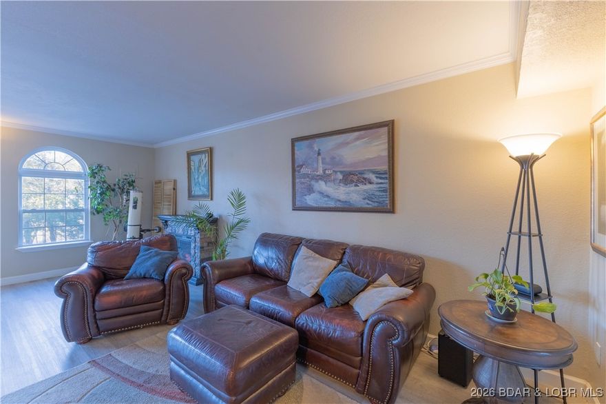 Affordable lake living is hard to find—this is your chance to start enjoying lake life without breaking the bank. Located in desirable Birchwood Estates and offers lake views with easy lake access just steps from the community boat ramp—perfect for kayaks and paddleboards. Move-in ready with a 2 stall garage offering plenty of storage, this home is an affordable way to embrace the lake lifestyle. The main level features an open floor plan, spacious living area, dining space, and a kitchen with abundant cabinetry and a convenient breakfast bar. Step outside to the private back deck, framed by a striking natural rock wall—an ideal setting for grilling and relaxing after a day on the water. Upstairs, you’ll find 2 generously sized bedrooms, full bath and access to the upper-level deck.  Centrally located this spectacular property offers quick access to golf courses, the hospital, shopping, dining, a golf cart ride to Margaritaville and all the lake’s top attractions. Whether you’re searching for a full-time residence, weekend getaway, or rental opportunity, this property delivers comfort, convenience, and exceptional value. Under contract with 72 hr kick out clause.