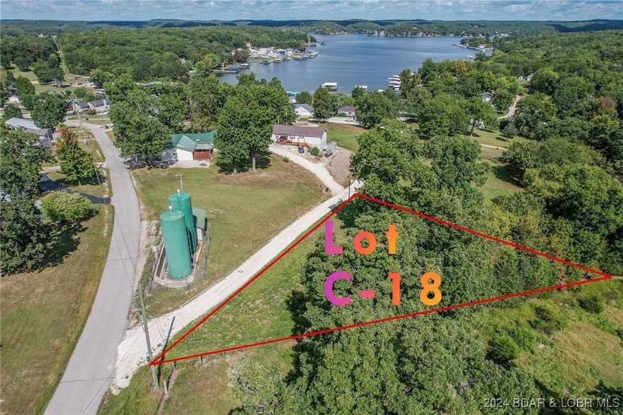 Another great lot in Johnson's Bay Subdivision! Lots of new construction going in here! Enjoy lake access via boat Ramp and all lots have water and sewer hookups! Buy the lot next to this one and have over 1.5 acres of building space. Great Views!