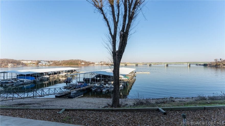 Walkout first floor turn key condo, Protected well lit boat dock,Beautiful main channel view, Extra storage, Open layout, Elevator, 
Comfortable well maintained 950 sq ft, 2 bedroom, 2 bath condo located at the Grand Glaize Bridge , center of Osage Beach. You can enjoy the beautiful view from your deck or the new sun deck! The pool is right across the sidewalk from the sun deck. To get to the pool, sun deck, or boat dock, you only have to walk down a few steps and then you are a short walk to each. No hills, only a few steps! There is an elevator for you right off the parking lot to take you to your ground floor condo. The 10x30 boat slip 18 in Dock B with a 6500LB lift and dock box. The dock is well lit and protected by a wave breake right in front of your condo. This special place is move in ready and waiting for you to come and enjoy, bring your close and fishing pole. P.S. Best crappie fishing on the lake!!