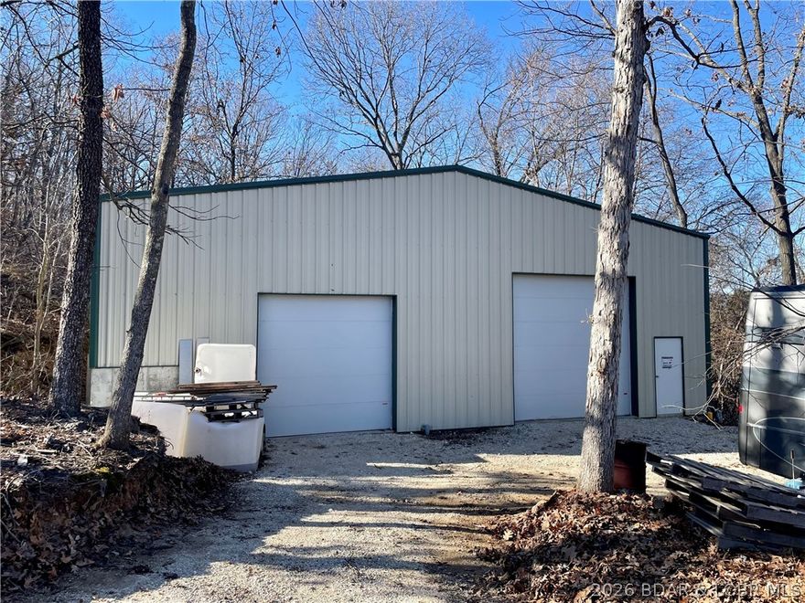 Looking for the ultimate man cave?  This 50x60 Shop/Building may be exactly what you want!  RV door, electric, plenty of parking, concrete floors, with 2 overhead doors big enough for an RV and your extra toys.  Come take a look and start dreaming of how you will use your man cave!  Looking for the complete package?  Check out mls 3584765