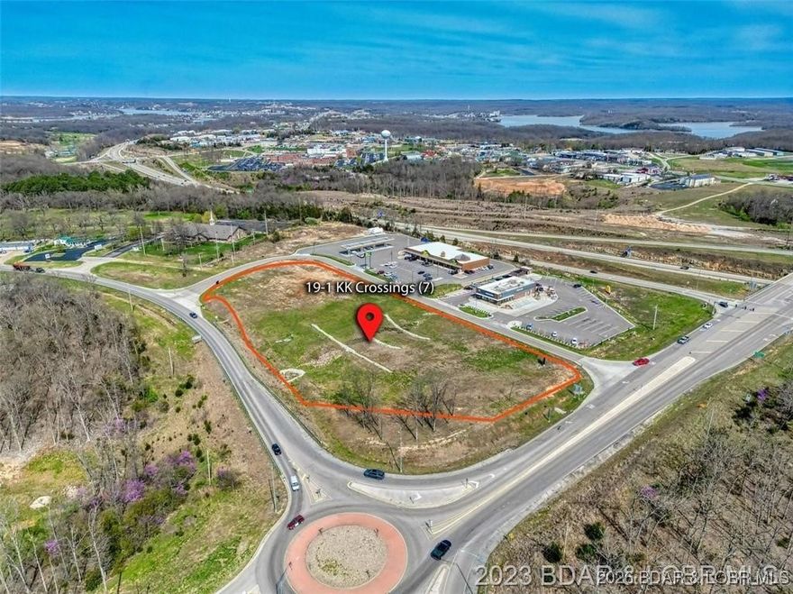 The last remaining commercial lot at KK Crossing in Osage Beach at the KK interchange and Hwy 54.. 3.4 acres of ready-to-build real estate with big traffic generators, McDonalds and Macadoodles already on site and operating. The average daily traffic count is a seasonally adjusted 44,000 vehicles per day. Nearby is Margaritaville, Lake Regional Hospital and the under-development Oasis Amusement Park and Marriott Hotel. The west side of Osage Beach is where the growth of the lake is taking place. A new 100 acre, yet to be named development is within 1 mile of this site at this interchange as well as a large permanent and second home population.