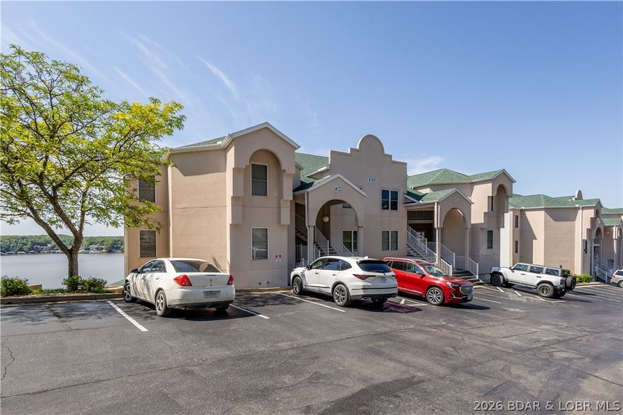 If you are looking for a condo with a view, this is it! This 2 Bedroom 2 Bath Condo at MM 14 is turnkey and ready to go. Priced below appraised value, has solid rental history, and the condo comes furnished with everything you need.  It also has a 12 x 36 boat slip to sweeten the deal! Have the best of both worlds with quiet enjoyment away from the waterfront but it still provides panoramic views! Emerald Bay is pet friendly, offers 2 Heated Salt Water Pools, Club House with Fitness Center, Tennis & Basketball. This is a great location, not far from Hwy 54. Close to Bagnell Dam Strip that features street parties, shopping & dining. You don't want to miss this one!