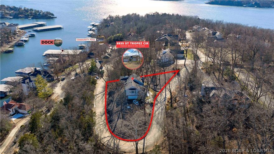 Offered for the first time by the original owner, 6835 Saint Tropez Circle is an immaculately maintained Lake of the Ozarks retreat in Osage Beach with a beautiful lake view. Set on .62 acres, this 4BR/2.5BA home offers over 3,000 sq ft and a multi-level layout with a walkout lower level; giving everyone room to spread out, gather, and make memories. Inside, cozy evenings are easy with a wood-burning fireplace, while weekends naturally drift outdoors to the covered, screened deck; then out again to the open portion designed for grilling, lounging, and soaking in those sunset skies. And when it’s time for a lake day, your 10x30 boat slip on the community dock sits just below the community pool, making it simple to go from a quick swim to a cruise in minutes. A rare St. Tropez opportunity - first time on the market and ready for its next chapter.