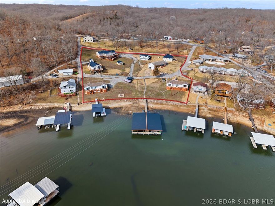 Calling all Investors! This is an exceptional opportunity for a multifamily investment package that is perfectly positioned for short-term rentals, long-term income production, resale as individual homes, or transformation into a premier family compound. Spanning 2.44 acres with an impressive 250 feet of cove-protected lakefront on the 8 Mile Marker, this offering includes seven properties comprised of two lakefront homes and five additional homes featuring lake views and lake access to the community dock. Altogether, the portfolio boasts 21 bedrooms, 13 bathrooms, and over 11,000 square feet of livable space, creating significant income and redevelopment potential. The waterfront has a community dock offering eight 10x24 slips plus a private dock with a 10x20 8-foot slip and concrete swim platform—ideal for maximizing rental appeal or owner enjoyment with additional room to expand. Centrally located near some of the lake’s best dining, shopping, & entertainment with substantial scale, expansion possibilities, and undeniable blue-sky upside, opportunities like this rarely come available in one package.