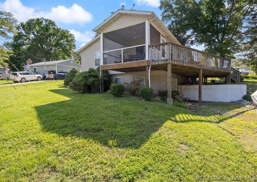 Vacation or Full Time Home.  Well taken care of 3 Bedroom 2 Bath Lake Access Home in Georgene Subdivision. Original home built in 1986 with Addition and Remodel in 2003.  Large Deck and Screened in Porch for Relaxing with Seasonal View in fall and winter.  1 Car Garage helps hold all your Lake Toys.  Includes a 10x24 boat slip with lift in Dock B.  Great Lake Access with Dock Slip, 3 Subdivision Lake Front Easements with Swim Areas and Boat Ramp.  Make this Your Lake Getaway or Full Time Home Today.