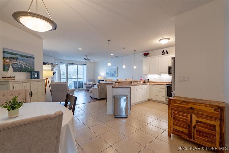 Lakefront Living or Investment Opportunity! This beautifully maintained 3-bedroom, 2-bath lakefront condo at the highly sought-after Lands End Condominiums offers the perfect blend of comfort, convenience, & income potential. Previously used as a rental/investment property & partially furnished, this unit is ready to generate returns or become your personal lake retreat.
Enjoy breathtaking main channel lake views from the open-concept living, dining, & kitchen area—ideal for entertaining or relaxing after a day on the water. Recent upgrades of new living room flooring & new HVAC system in 2025, provide peace of mind. Elevator from the parking lot makes access effortless for owners & guests. Enjoy all the resort amenities Lands End offers, a cove-side pool, lazy river, clubhouse, playground, & exercise room. Boating enthusiasts will appreciate the 12x36 dock slip, protected by wave breaks. Located close to popular restaurants, shopping, trampoline park, & amusement oasis, this condo offers unbeatable convenience and entertainment. Whether you’re looking for an income-producing property or a lakefront getaway, this condo checks all the boxes. Don’t miss this exceptional opportunity!