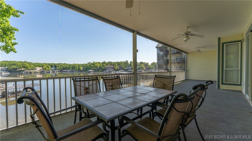 All included - garage, boat slip, boat hoist, and furniture! Enjoy lakefront living in this spacious 3 bedroom, 3 bath end unit at Evergreens on the Lake. This beautifully furnished condo features an open layout, perfect for entertaining, and a huge screened-in deck overlooking the water. Located at the 18 MM by water, just across the bridge in Sunrise Beach, you’re only minutes from Lake Ozark and Osage Beach shopping, dining, golf, and entertainment. Close to Dog Days and Backwater Jacks by water. The well-maintained complex received new roofs in 2024 and offers fantastic amenities, including a community pool, clubhouse, and tennis courts. Whether you’re looking for a full-time residence or a weekend getaway, this turnkey condo delivers comfort, convenience, and the best of lake life all in one serene​​‌​​​​‌​‌​​​​‌​​‌​​​​‌‌ setting.