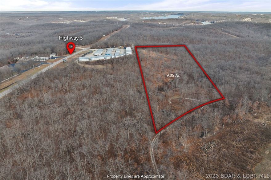 Rare 9-Acre Investment Opportunity Near Lake of the Ozarks. Discover unparalleled potential with this versatile 9-acre tract, perfectly positioned just off the intersection of Highways 5 and 7 near Camdenton, Missouri in Greenview. This property offers the ideal combination of privacy, accessibility, and flexible zoning, making it one of the most compelling investment opportunities in the Lake of the Ozarks area. The land is a wide-open canvas ready for your vision—whether it's a dream home, a new business, or a lucrative development. Develop cabins, lodges, or boutique hotels to serve the booming Lake of the Ozarks tourism market. Investor friendly and benefit from low annual taxes, no HOA restrictions, providing multiple avenues for a high return on your investment. Outstanding visibility and easy access to major highways. Conveniently located just 10 minutes from Camdenton and 5 minutes from Woods Grocery. An adjoining acreage is available MLS #3583589 providing a larger development. Secure your own piece of tranquility. Build a custom dream home, a Barn-dominium, or enjoy it as a private hunting retreat or getaway property surrounded by nature. Call now for your Private Showing