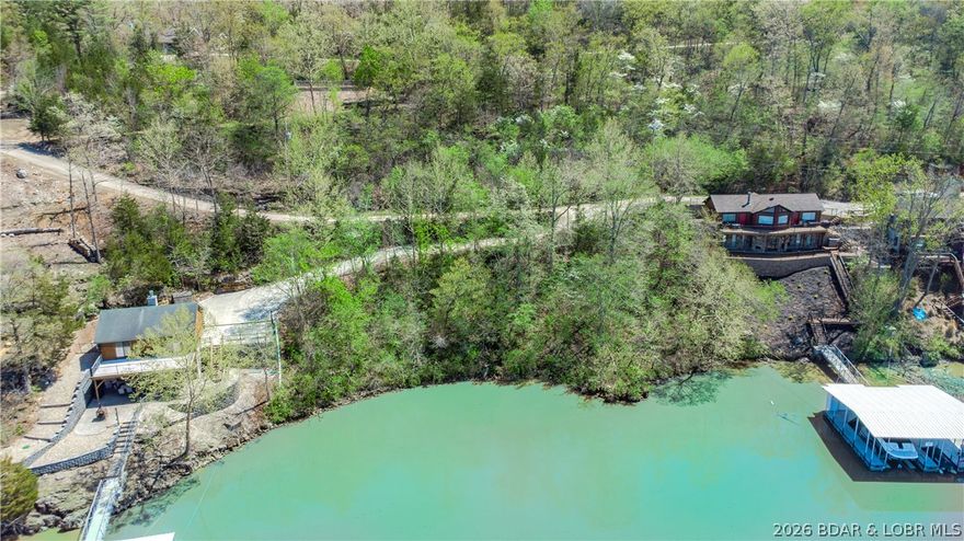 Build your dream lake escape on this stunning lakeview lot tucked away on the quiet side of Lake of the Ozarks. Offering breathtaking views—wide water, peaceful surroundings, and a level of tranquility that’s getting harder to find.

Whether you're envisioning a full-time residence or a weekend retreat, this property provides the perfect setting to create something truly special—where mornings start with coffee overlooking the water and evenings end with sunsets and stillness. There’s room to design a space that fits your lifestyle, surrounded by nature and privacy, yet still close to everything you love about the lake lifestyle.

By water, you’re near favorites like The Cave Restaurant, Nauti Fish Rum Bar, and Larry's on the Lake, along with the iconic Bridal Cave. By land, enjoy breakfast at Rise & Shine Cafe and explore the trails and castle ruins at Ha Ha Tonka State Park, then choose from the Hillbilly Hut or the Burger Basket on your way home.

This is the quieter side of the lake—where the pace slows, the views stretch wide, and the experience feels like the lake was meant to be.

POTENTIAL ADDED BONUS!!! An adjacent lot is also available to expand your footprint.