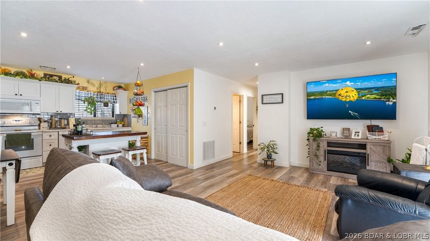 Located in the heart of Lake Ozark off of Horseshoe Bend, this updated 3BR/2BA home offers comfort, flexibility and an outstanding value. Updated in 2019 to include new HVAC, flooring, interior paint, appliances, cabinetry, recessed lighting and a tiled master shower, giving the home a fresh, modern feel.  The two-car garage provides added versatility, with one half that is finished and included in the total square footage. This space is being counted as the 3rd bedroom and could easily be further finished to create a true bedroom, office, or even a bedroom with adjoining mud/utility room.  Or, if desired, it is easily converted back to a large 2 car garage.  Situated on a desirable corner lot, the property features a partially fenced backyard, ideal for pets or entertaining.  You’ll love the central location with quick access to the expressway and the Bagnell Dam Strip, putting shopping, dining and lake activities just minutes away.  This is one of the most competitively priced homes on the market today and a fantastic opportunity for full-time living or as an income producing investment property.  Check it out TODAY!!