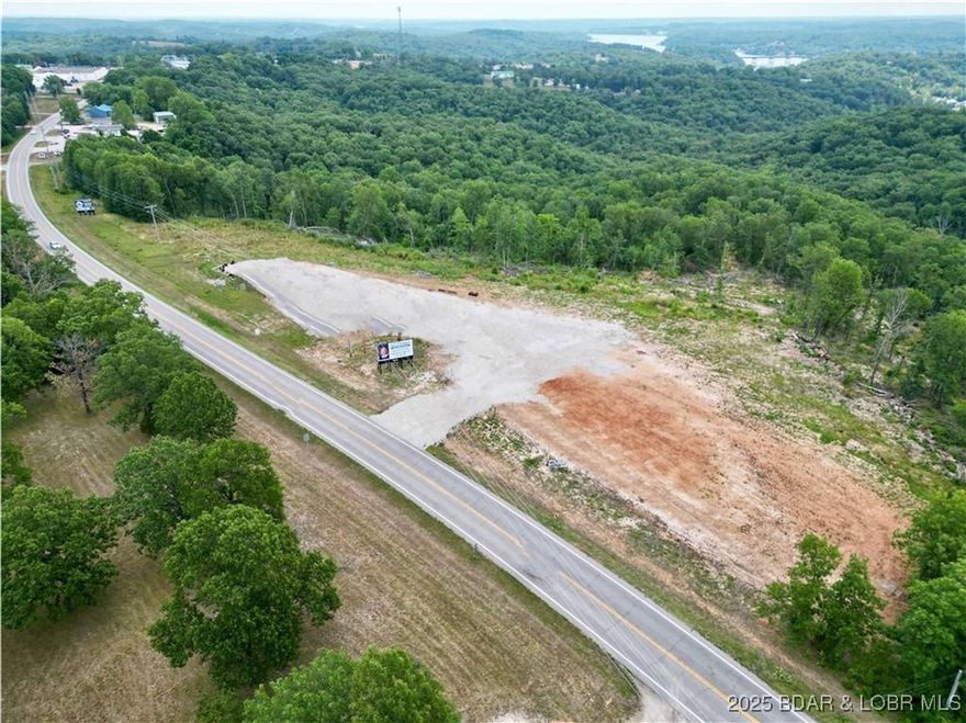 Excellent location for development. Over 900 feet of Highway frontage. Ideal visibility for additional billboard revenue, adding to the 2 billboards that generate revenue currently.  Property is zoned B2. Would also be a great spot for storage units or an RV park.