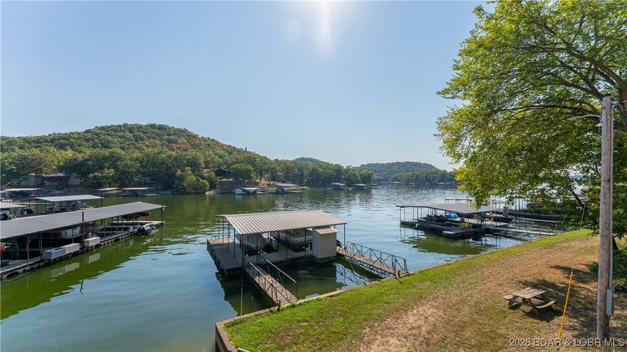 Welcome to lake life at an affordable price! This fully furnished 3-bedroom, 2.5 bath waterfront home has everything you need to start enjoying the Lake of the Ozarks right away. The property features a one-car garage and a 2-well concrete dock (12x28 & 10x28) complete with two boat hoists. Spacious composite decking provides the perfect setting for entertaining or relaxing while taking in main channel views with the protection of a deep-water cove.  Recent updates include a 2-year-old furnace (heat pump), water heater, new ductwork, and a WiFi-controlled thermostat, along with a WiFi-controlled water shutoff for added peace of mind. The kitchen boasts granite countertops, new waterproof vinyl plank flooring, fresh paint, and new interior doors and trim on the first floor. A cozy wood-burning fireplace adds warmth and charm. Whether you’re relaxing outdoors or heading out on the water, this move-in-ready home is designed for comfort, convenience, and making lasting lake memories.  The community ramp is for the Baltic Village Subdivison only, very close to the house/dock.  Back on the Market - no fault of the Seller!