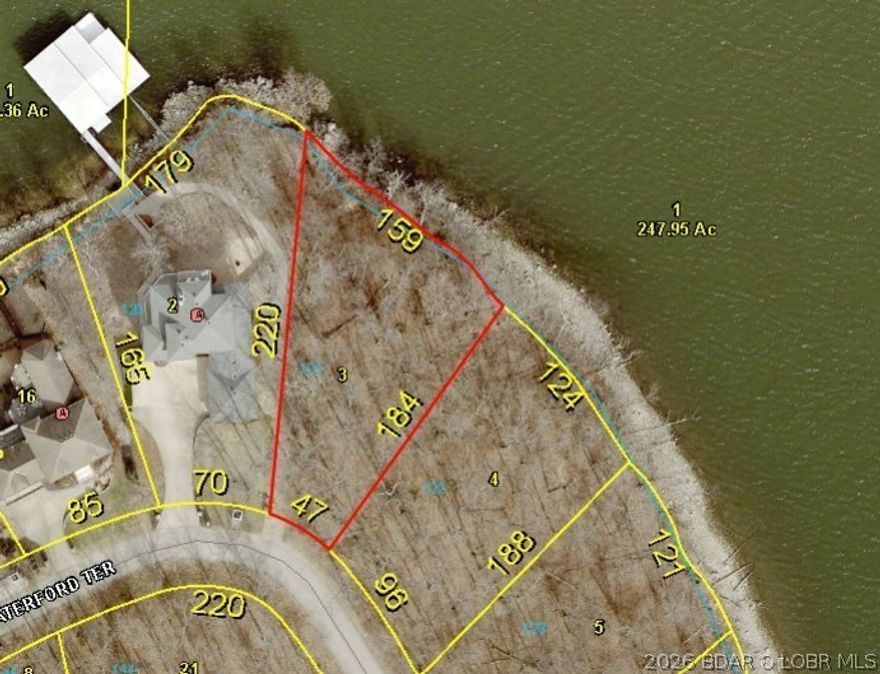 FANTASTIC VIEW OF "THE LAKE" …....PREMIUM LOT....…COVE PROTECTION……DEEP WATER……EASTERN EXPOSURE…… “PRIVACY OF A DEAD-END STREET”.....(159 LIN. Ft. of BEAUTIFUL LAKEFRONT)...Lot Dimensions are (159 L.F. x 185 x 47 x 221). Premier location in Porto Cima where the Jack Nicklaus designed Golf Course, The Porto Cima Yacht Club & The Club at Porto Cima are right around the corner with a variety of memberships available. Includes use of all Four Season's amenities including; Hiking & Biking Trails, RV Park and Camping, 3 Private Fishing Lakes, Multiple Pools, Tennis Court, Kay's Point Pavilion and Playground, Kay's Point Dock & Boat Launch, Skate Park & Basketball Courts.