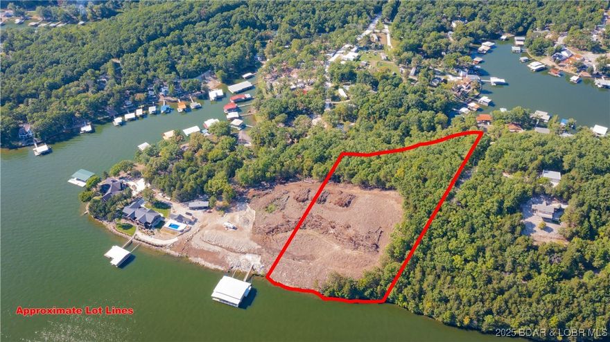 Once in a lifetime property cleared and ready for you to build your dream home! Over 4 acres of perfectly sloped land with jaw-dropping VIEWS for miles. You can see all the way down to the 4 corners on 31 mm! With approx. 300 ft of lakefront, you can spread out...maybe a pool house w/outdoor kitchen to enjoy the games with friends by the water? Maybe a monstrous dock? A guest house? Divide off some lots for friends or family and have a compound? The possibilities are endless. Great lots/land to build on is getting harder and harder to find, and this one is a special piece so don't wait! *Seller is willing to convey completed custom house plans (HUGE house w/private pool and over 9300 s.f. w 5 beds/5+baths), septic approval and gate materials to new owner!* Recent survey on file/available.