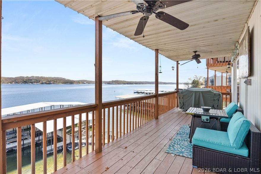 Experience the ultimate Lake of the Ozarks lifestyle at Tara Condominiums! Nestled at the 3MM in Lake Ozark, this quaint, character-filled complex offers some of the most breathtaking, miles-long views on the water. This newly updated 1-bedroom, 1-bathroom condo comes fully furnished and turnkey—just bring your bags and start relaxing. Inside, discover a "rustic meets lake" vibe featuring an open floor plan, sleek granite countertops, crown molding, and high-quality finishes throughout. The spacious bedroom includes a walk-in closet, and the covered lakeside deck is perfect for soaking in those endless views. For the savvy buyer, this unit offers incredible versatility as a high-potential nightly rental or an affordable private getaway. Boaters, take note: This unit includes one of only TWO of the largest slips in the community dock! The 12x28 slip features a raised roof to accommodate a larger cruiser and comes equipped with an 8,000-lb boat hoist. Located minutes from premier shopping, dining, and world-class entertainment, this is the lake retreat you’ve been waiting for. Schedule your private tour today and make the smarter move to the lake!