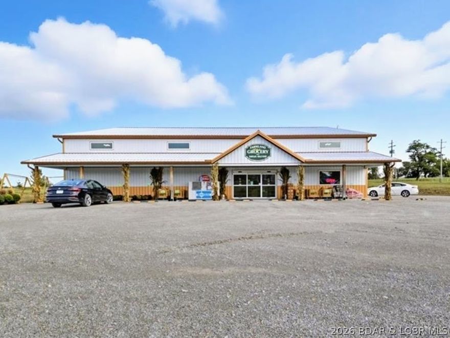Don’t miss this opportunity to own a profitable, fully operational surplus grocery store located directly on Highway 50. The business operates from a modern 6,688 sq. ft. building built in 2022, set on 9.24 acres with visibility, easy access, and plenty of room for future expansion. This is a true turnkey opportunity, with the sale including all existing inventory, multiple coolers, checkout stations, a modern POS system, semi-trailers for storage and transport, and a skid steer—everything needed to continue operations from day one. The store has developed a strong and loyal customer base and a proven track record of profitability. Similar to popular surplus grocery concepts like Dutch Country Store and Sunshine Market, it attracts value-focused shoppers from across the region. The upper level of the building offers additional potential, with space that could be converted into a private residence, on-site manager’s quarters, or expanded office space. The surrounding acreage also provides opportunities for growth, including additional parking, storage buildings, or other business ventures. To help ensure a smooth transition, the seller is willing to provide training to the new owner