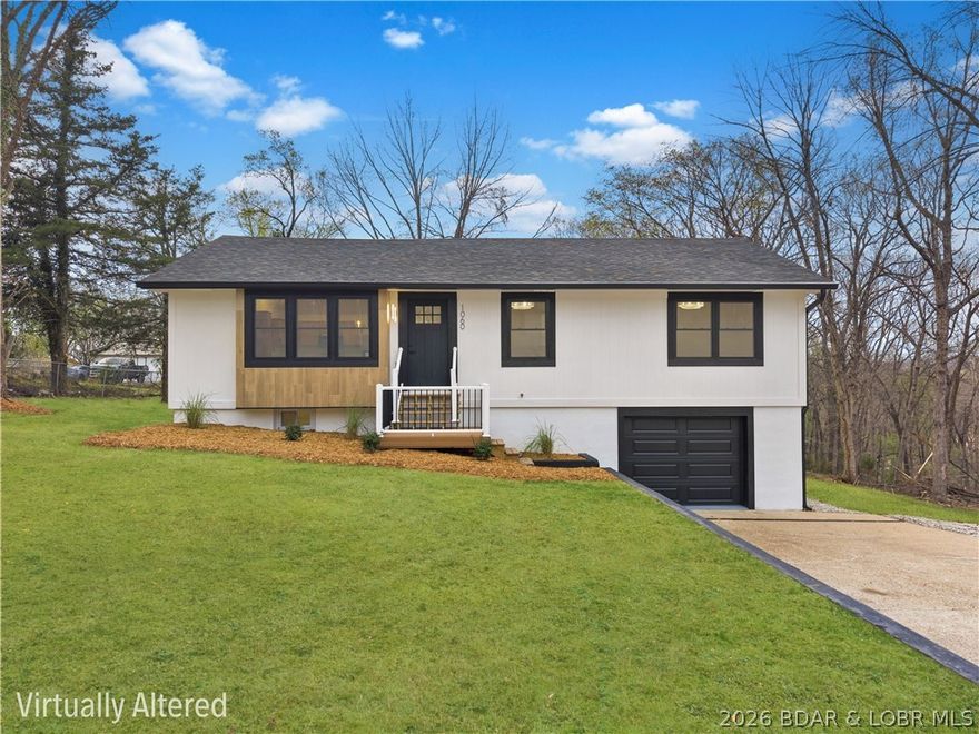 This one didn't just get an update- it got a complete reset & pumped full of NEW Life! Taken down to the studs & rebuilt with today's buyer in mind, this Osage Beach home delivers that "brand new" feel without the hefty price tag. Completely reimagined from the inside out & located in one of the area's most convenient in-town locations at end of a quiet street. Walking inside you'll find a fresh modern interior that is truly move-in ready. Featuring new double hung windows & sliders to brighten entire space, premium 5' plank LVP flooring, large granite kitchen island, efficient HVAC & open concept floorplan for comfortable easy living. The main floor offers 3 beds & 2 full baths with floor to ceiling tile showers complemented by gold accents for an elevated look. The primary bedroom includes en-suite with its own access to exspansive rear deck that spans the home & connects to kitchen. Lower floor gives flexibility of an additional living room, plus 4th bedroom, custom full bath, walk out door, finished garage with polished look & epoxy floor. Out back an oversized flat yard offers room to expand & play. If you've been waiting for a home that is fresh & priced right, this is it!