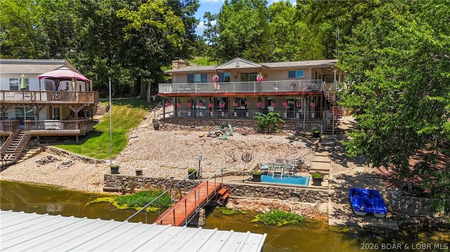 Check out this Amazing Lakefront Home at MM38 in Sunrise Beach! This beauty is a recently remodeled 3 bed, 2.5 bath w/a partially covered deck, private boat ramp, and rustic chalet w/loft for dry storage and a separate area for water toys w/extended roofline. This well cared for home is the ideal family setting with an open floor plan, dream kitchen with custom cabinets, gentle slope, 2 wood fireplaces w/blowers, an abundance of new windows with natural light and great lake views, new lighting throughout, an oversized driveway, additional lakeside seating, built-in exterior Bluetooth speakers, and two well dock and swim platform. All rock yard means no mowing EVER on private road one mile from Highway 5. This is the perfect location to entertain friends and family as it is just minutes from Shopping, Restaurants, and Bars! Great location by land & water! Come see this one today before its gone!