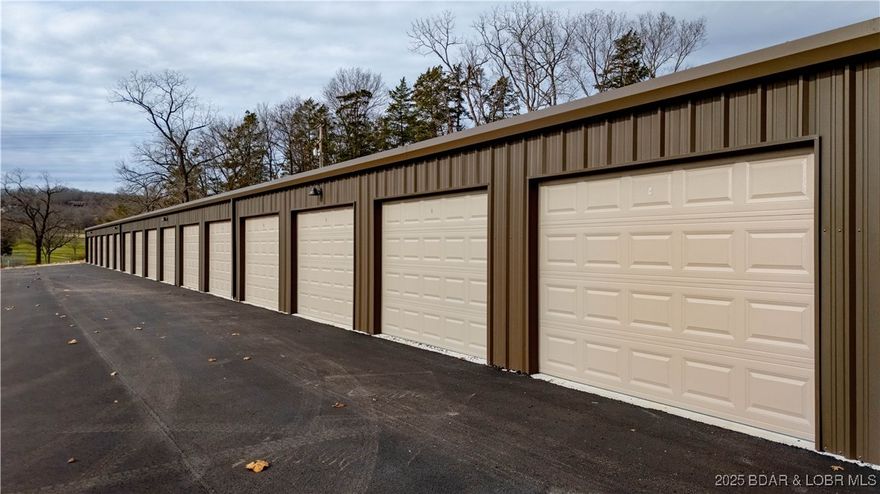 Now nearing completion, these brand-new cold storage garages offer a rare opportunity in a prime Camdenton location right next to Cedar Glen Condos and Lake Valley Golf Course. With a total of 38 units available, these garages are designed to meet a wide range of needs and are sure to move quickly. Each garage measures 12 feet wide and 26’9” deep, featuring automatic garage doors for easy access. With no restrictions in place, the possibilities are endless—use them for personal storage, lake toys, fishing gear, or as an investment in a high-demand market where storage is always limited. Ideal for condo owners needing extra space, anglers looking to keep their boat close to some of the area’s best fishing and boat ramps, or anyone seeking secure storage in the heart of the Lake of the Ozarks. Pricing set to increase as availability decreases so don’t miss your chance to secure one of these highly sought-after garages before they’re gone!