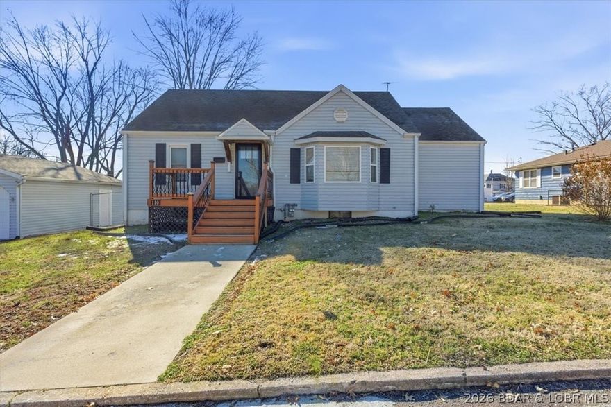 Charm and Character in Every Corner! This beautifully renovated 3-bedroom, 1-bath home perfectly blends
classic character with modern updates. Step inside to find original hardwood floors that set a warm tone
throughout. The updated kitchen features newer cabinets, granite countertops, stainless steel appliances, and a
custom tile backsplash. The inviting family/office room offers a cozy gas fireplace with a brick hearth and
custom built-in cabinetry. The spacious main bedroom includes both a walk-in closet and a second closet for
added storage. The bathroom shines with a new vanity, large mirror, and a tub/shower combination. A major
renovation in 2021 brought new sheetrock, electrical wiring, windows, lighting, ceiling fans, and a front porch
deck with elegant wrought iron railings and HVAC has been updated. Upstairs, 3rd bedroom has pine floors,
built-in shelving, and a cedar-lined walk-through closet, use it as a workout space, or office. The basement
includes laundry hookups, water softener, and ample storage shelving. Outdoor living is just as impressive with
a large fenced backyard and concrete patio. Oversized detached two-car garage with a concrete driveway.