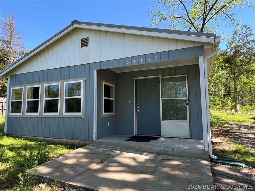 Welcome to your perfect Lake getaway at Lake of the Ozarks! This charming 1-bedroom home with a non-conforming second bedroom offers just the right amount of space for weekend escapes or full-time lake living. Inside, you’ll find a functional kitchen, a spacious living room perfect for relaxing after a day on the water, and a beautifully tiled shower that adds a touch of modern comfort.
Whether you're looking for a personal retreat or an investment opportunity, this property checks the boxes. Located just minutes from convenient boat ramps, a swim beach, and waterfront dining, you’ll have everything you need to enjoy the lake lifestyle. Seller would consider selling turn key! Load up the boat, grab your friends, and come experience all that Lake life has to offer—sun, water, and laid-back living await!