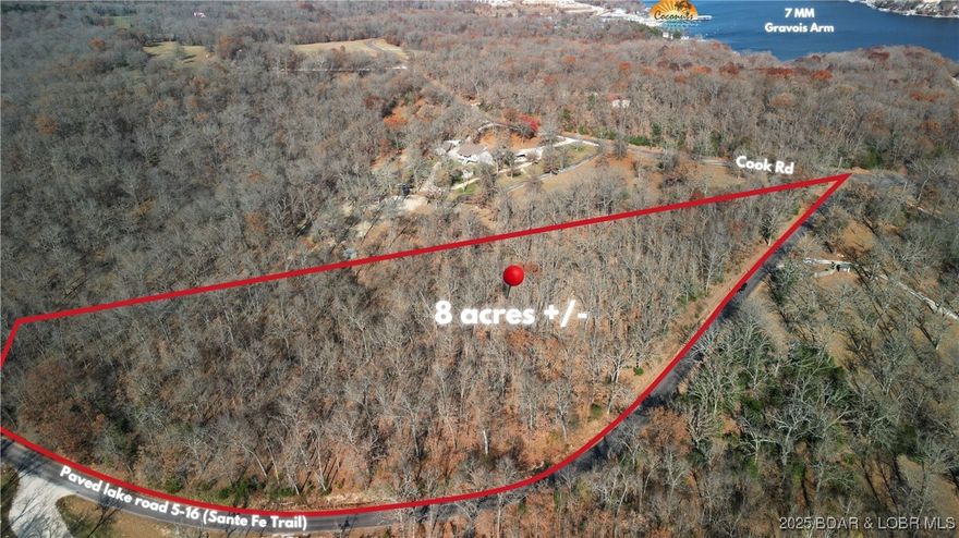 Just over 8 acres positioned directly off paved Lake Road 5-16 (also known as Santa Fe Trail) this Gravois Mills tract delivers a great development opportunity on the west side of the lake. With multiple access points off Santa Fe Trail, this location offers flexibility, visibility & convenience rarely found in larger lake road parcels. The land itself is beautiful: gently rolling terrain, mature trees, and the kind of natural setting that lends itself to everything from residential development to private estate sites to income-producing concepts. Being within the Gravois Sewer District only strengthens the possibilities, removing hurdles and opening doors for future plans (sewer line runs along property on Santa Fe Trail road frontage). Whether you’re looking to hold, build, subdivide, or create something entirely your own, this acreage sits in the heart of the west side of the Lake of the Ozarks.