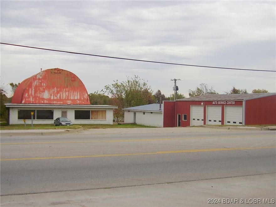 Perfect Location in Buffalo for your Business. Highly visible with 130 Feet of Highway Frontage on US 65 close to junction 65-32 intersection. Would be a great Location for any type of Business. Main Building has 3,850 SF and has been used for Service Business, Laundromat and Retail. There is an Office, 3 large Overhead Doors and 1 Bathroom. Back Room was used as a Machine Shop. Second Building would make a good Warehouse and is 4,700 SF with one Bathroom. Both Buildings have Concrete Flooring and are on City Water and Sewer. MoDot Traffic Count is 15,000+ cars per day. Motivated Seller, bring Offers.