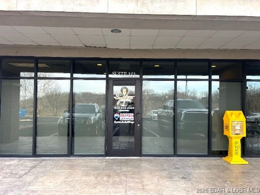 Elevate your business in the iconic Landmark Building, one of the most prestigious office complexes in town! Centrally positioned in a high-traffic area with effortless access to amenities, this walk-in level suite surrounds you with professional neighbors and instant credibility. Step inside to a versatile layout featuring 4 private offices, a reception desk area, a generous conference room, 2 bathrooms, a kitchen, and a clean, neutral palette ready for your brand's touch. Perfect for established businesses or growing ventures, this space blends affordability with prime visibility and functionality in a highly desirable location. Plus, there's ample parking that exceeds city requirements. Opportunities like this don't come around often. Secure your professional future in the brick and steel constructed Landmark Building. Schedule a showing today and make this standout suite your gateway to success in the heart of thriving Osage Beach!