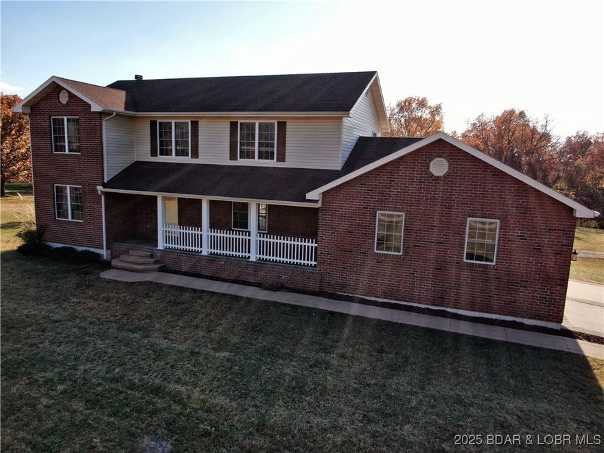 The seller is motivated and will consider any reasonable offers. This beautiful 4-bedroom, 3.5-bath home is located in the sought-after Pendleton Acres subdivision on a desirable corner lot. Enjoy a welcoming front porch and a spacious back deck overlooking the backyard, perfect for comfortable outdoor living. Inside, the open floor plan features abundant counter space and a cozy wood-burning fireplace in the living room. The mudroom, walk-in pantry, and oversized two-car garage provide ample storage, while the lower level includes additional storage space, ideal for a lawnmower or other equipment. The master suite offers a walk-in closet and a luxurious walk-in shower. Two additional bedrooms on the upper level also feature walk-in closets. The large, finished lower level can serve as a family room, game area, or flexible living space.  This exceptional home is move-in ready and waiting for new owners to enjoy. If you're seeking more space for all your needs, now is the perfect time to make this property yours.  Seller is offering a $12,000 credit at closing for a new roof.