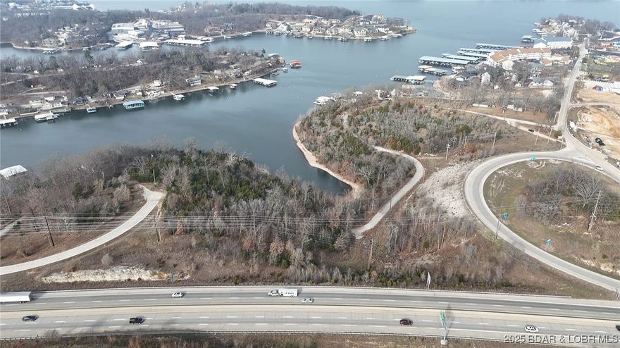 Exclusive Lake Ozarks Waterfront Development Opportunity!! Experience one of the last great pieces of prime shoreline real estate on Lake of the Ozarks. Spanning 1 to 17 acres with over 1,800 feet of pristine waterfront, this property offers endless potential for a luxury resort, marina, or private estate enclave. Situated along prestigious Jeffries Street, these commercial and waterfront lots combine elite accessibility with breathtaking panoramic views. Property highlights are gently sloping terrain ideal for luxury builds, exceptional water frontage and sunset exposure and rare large-acre offering in the heart of Lake of the Ozarks. All utilities nearby and easy highway access.