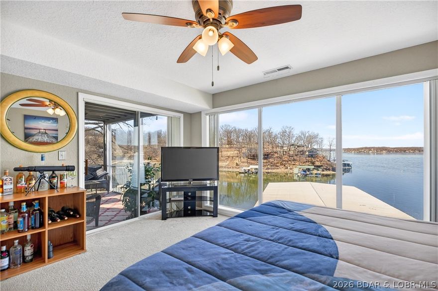 This fully furnished end-unit condo offers sweeping lake views, abundant natural light, and an open layout perfect for relaxing or entertaining. Just steps from the dock and minutes from popular waterfront restaurants and bars by boat or road. Enjoy the ideal blend of peaceful lakefront living and nearby entertainment. Optional boat and PWC package available for a true turnkey experience. Don’t miss this rare opportunity to own your lake getaway!