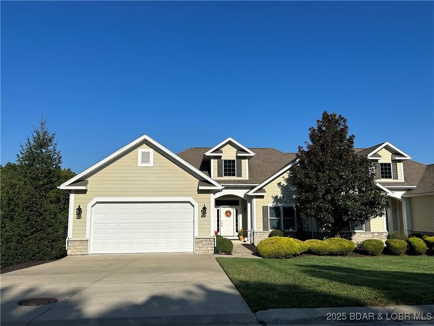 Recently updated lakefront villa with high-end finishes that shows beautifully. Upon entry, you’re welcomed by soaring ceilings and stunning lake views. The great room features a gorgeous fireplace and flows seamlessly into the open kitchen and dining area, with access to a screened-in deck. The kitchen offers premium appliances, gas range, pot filler, and generous cabinetry. Main level also includes an oversized laundry, pantry storage, half bath, and an oversized garage with attic storage. The spacious primary suite offers an upgraded bath with double vanity, tiled walk-in shower, soaker tub, and walk-in closet. The lower level features a large family room, second ensuite bedroom with upgraded bath and walk-in closet, an additional lakeside bedroom with access to a full bath, a fourth bedroom, and ample storage. Step out to the expansive lower deck with direct lake access—private and perfect for entertaining. Community amenities include a private pool, swimming off the docks, and full Four Seasons amenities with indoor/outdoor pools, playgrounds, boat ramps, and POA clubhouse with gym. 14x40 dock with hoist and PWC slip available. Four Seasons dues $69/month. Golf cart available.