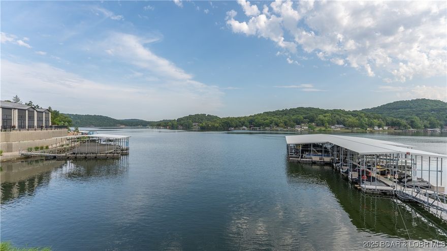 Welcome to lake living at it's best!  This beautifully updated, fully furnished 2 bedroom, 2 bath condo offers comfortable living space and breathtaking lake front views at Lake of the Ozarks.  Enjoy peaceful mornings and colorful sunsets from the deck of your private lakefront setting.  The interior features modern updates throughout, open living and dining area, and a well appointed kitchen with appliances included.  Both bedrooms are generously sized with a private bath in the primary suite.  Step outside and enjoy great community amenities including a pet-friendly green space, a scenic lakeside boardwalk, and easy access to the water.  Take advantage of the community pools, ideal for meeting friends and cooling off on warm summer days.  The condo also incudes a boat slip with hoist in Dock G-1, perfect for enjoying everything the lake has to offer.  Conveniently located near popular golf courses, and popular restaurants, this property is ideal for full-time living, a weekend retreat, or an investment opportunity.  This turn-key condo delivers the lifestyle Lake of the Ozarks is known for - water views, boating convenience, and low maintenance living.  Let get started!