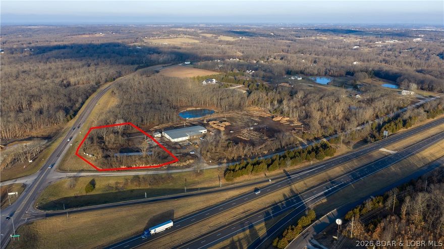 Prime commercial opportunity at a signalized corner in the heart of Eldon, offering approximately 2± acres with exceptional visibility at the intersection of Highway 52 and Highway 54. This high-exposure location sits along one of the region’s most heavily traveled corridors, capturing consistent daily traffic counts and serving as a key artery to the Lake of the Ozarks. Ideal for gas stations, convenience stores, quick-service restaurants, or national retail users seeking maximum frontage and accessibility. The site offers excellent ingress/egress potential, strong corner presence, and unmatched signage visibility from both highways. Surrounded by established commercial activity and positioned in a growing trade area, this parcel presents a rare opportunity for developers or owner-users to secure a premier footprint in a supply-constrained corridor. 3-stage electric access on-site. High demand, limited inventory—strategically located sites of this caliber rarely come available. Up to 12.5 additional adjoining acres available for purchase!! Call now before this premium opportunity slips through your fingers!