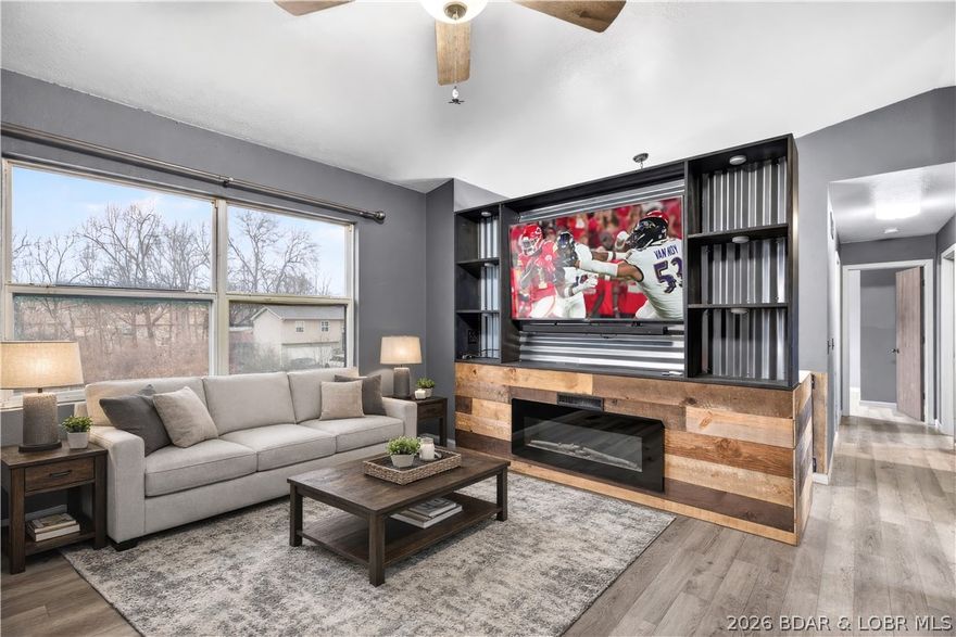 Located in the desirable Seven Trails West subdivision at the Lake of the Ozarks, this 4-bedroom, 1-bath split-level home offers comfort, convenience, and thoughtful updates throughout. Just minutes from the Camdenton School campus and close to all Camdenton amenities, the location makes everyday living easy.

Inside, you’ll find new LVP flooring, a stylish pallet wall entertainment center, and a beautifully updated custom shower that adds a modern touch to the home. The HVAC system has been fully serviced and professionally cleaned, giving buyers added confidence in the home’s mechanical condition.

A pre-listing inspection has already been completed with items addressed for peace of mind. With a full-price contract, the seller will also replace the roof and broken windows.

Outside, enjoy a large fenced backyard perfect for pets, kids, or entertaining, plus the convenience of a 2-car garage.

Move-in ready, well maintained, and located in a great neighborhood—this home offers both value and peace of mind.