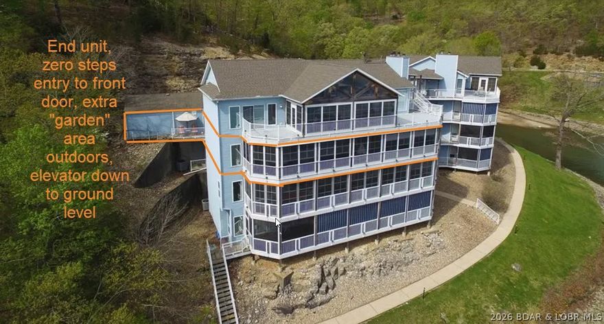 With a Panoramic view of the Lake of the Ozarks, this zero steps entry Condo has 4 bedrooms & 3 baths and over 2200 square feet of open concept living.  It's an end unit and the only unit with a direct connection to the garage from inside the home.  There is storage galore and the screened porch is the full length of the unit offering space for an additional dining space, living space, workout area, game area and more.  There is a full house sound system, two master bedrooms with en-suites, custom kitchen cabinets, granite counters, a gas fireplace, an extra office, and a dedicated laundry area.  This unit has a private garden area also:)  Oh, and of course there is an elevator down to the lake/docks.  One 12x28 dock with an 8000 lb lift and a PWC slip with lift that will hold two pwc (options for larger dock)!  No rental units in the complex so there will never be a stranger on the dock.  You'll have access to 3 pools, tennis/pickleball courts, boat ramps, fitness center, clubhouses, horse stable & riding trails, and more.  The HOA fees include Internet, DirectTV, water, sewer, trash, building insurance, all exterior maint, and more.  Easy lake living at its best!