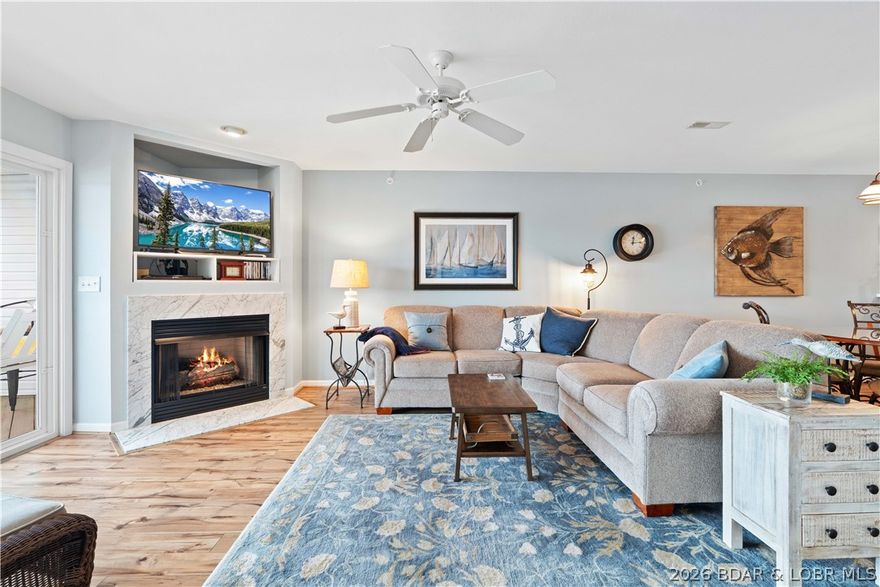 Ease into lake life and let the views take over—this is where calm mornings and wide-open water become your everyday backdrop. Nestled alongside the natural beauty of the Lake of the Ozarks State Park, this beautifully furnished 2-bedroom, 2-bath condo offers a peaceful escape with serene waters and stunning scenery right outside your door.

Overlooking one of the lake’s most tranquil areas, this 1,050 sq ft retreat is perfect for slow mornings, sunset views, and easy lake days. Enjoy the quiet setting while still being just minutes from Osage Beach dining, shopping, and entertainment.

Fully furnished and move-in ready, it’s ideal as a personal getaway or investment with nightly rentals allowed. Just one level up from parking makes access simple and convenient.
A 12x32 boat slip with lift is included, giving you immediate access to some of the best boating and fishing on the lake. The complex also features a pool and playground—perfect for family and guests.
Peaceful, inviting, and ready to enjoy—this is lake living done right.