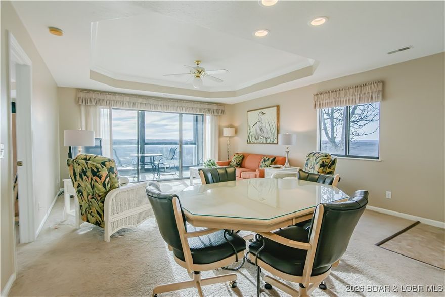 Turn-key 3 bedroom, 3 bathroom condo located in the desirable Osage Vistas complex, perched on a bluff with sweeping views of Lake of the Ozarks. This spacious unit features a highly sought-after lockout design, offering one bedroom and bathroom that can be rented separately or together with the main condo—making it an excellent investment opportunity or flexible personal getaway. Whether maximizing rental income or hosting guests with added privacy, this layout delivers versatility and value. The condo is being sold fully furnished and turn key, allowing you to start enjoying or renting immediately. Osage Vistas offers six outdoor pools, grilling stations conveniently located just outside the condo, and beautifully maintained common areas. The property is shared with the Regalia Hotel, giving owners access to concerts, local events, and the iconic Hippopotamus pool featuring an outdoor swim-up bar at the heart of the complex. Enjoy resort-style living with panoramic lake views, entertainment at your doorstep, and strong rental potential—all in one exceptional Lake of the Ozarks property.