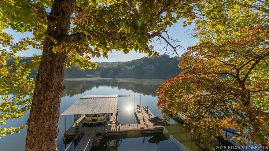 Highly Motivated, Make an Offer.  Great Investment opportunity. Nice 2 Bedroom Turn Key Lake front home. In very peaceful and quit possum Hollow Cove off of Lyn Creek Cove. Close to several restaurants, by boat or land. Shopping and other activities Also are close. One well boat dock. All furniture, appliances, See Inventory. The home next door at 64 Possum Hollow Court is also being sold. Listing #3581077. Buy both live in one and rent the other one. 2009 Sundancer Tri-Toon 24' with a 2009 Suzuki 140 HP Outboard 4 Stroke For extra $