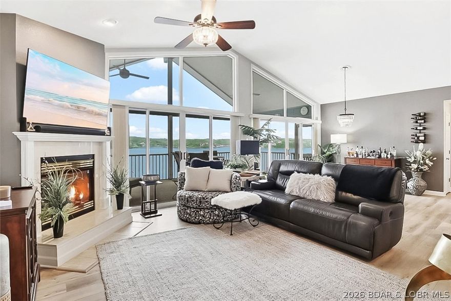 This top floor, 3 bedroom, 3 bath, a furnished condo is only one flight up from the steps & INCLUDES A GARAGE! The views from this condo are incredible and with the way the deck is positioned, you have complete privacy. The garage is closely located between the unit & the pool. The sellers put an extra refrigerator & freezer in the garage to easily access the pool area giving you extra space for your groceries. You can also see your 12X32 slip from your private deck located on dock 1, slip 2. There is also a PWC slip located at Dock 4, Slip 22 w/ lift included. Evergreen condos have an incredible layout maximizing the view with vaulted ceilings and vaulted ceilings on the deck. The afternoon shaded deck is the perfect place to relax and enjoy. The complex has a clubhouse, pool, tennis courts, playground, & pickleball.