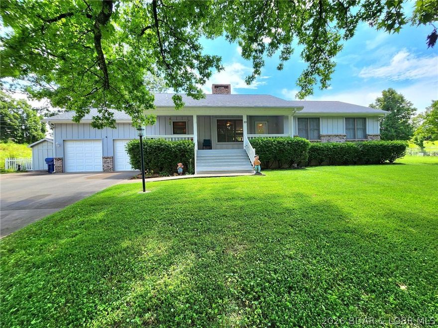 In Camdenton, Move-in-Ready Home w/ GORGEOUS Inground, Privacy Fenced, Saltwater POOL & Large Pool Patio/Garden Areas. 3 Blks to Town Sq. VERY NICE, Friendly, Well Maintained, SLEEPY, SHADEY Neighborhood. Easy Access 2-5 Minutes to Schools & Shop’g. Pride-of-Ownership displayed in this Impressive, Meticulously Well Maintained Home, Pool & Yrds. 3 Bd, 2 Full Bath, 1503 sq/ft, 1 Level Liv’g w/ LvRm, DinRm, Spacious Kitch, Laundry/Mud/Pantry Rm & Gas Brick “See-Thru” Firepl. Spacious 24x24 Attch 2 Car Garg w/ Abundance of Storage & Elect Chair Lift into home for the Physically Challenged. Whole Home H20 Filter System, H20 Softener. Inground Yrd Irrigation/Sprinkler System. Gorgeous Wood Flrs, Newer Custom Built Wood Cabinets in LivRm, Large Peaceful Covered Front Porch to Enjoy the Mature & Landscapted Yrds & Seasonal Creek @ Property Line. The POOL 3’ & 6’ Deep will WOW You!!! When in Season Pool Area is SIMPLY STUNNING w/ Perennial Flower & Veggie Beds, Grassy Areas, and Lots & Lots of Concrete Pool Patio Area which is Wired for HOT TUB. Most Pool Components Recently Replaced. Security/Monitoring System for Pool & Home Stays.  Must See the EXTRA FEATURE SHEET for more DETAILS