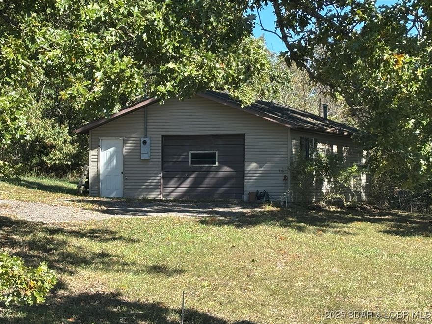 Exceptional opportunity to own 1.4 acres in a high-visibility, high-traffic location along the busy Laurie, Missouri corridor. This property offers excellent exposure and accessibility, making it ideal for a wide range of commercial or mixed-use possibilities.

The site includes an existing garage/shop with restroom, providing immediate functionality for business operations, storage, or service-based use. With ample room to expand, this property is well-suited for future development or growth.

For investors or owner-users seeking even greater potential, this parcel may be purchased in conjunction with MLS #3582583, creating a rare opportunity to significantly expand acreage and maximize development options.

Whether you’re looking to establish a business, expand an existing operation, or invest in a prime growth area, this property offers location, flexibility, and long-term potential.