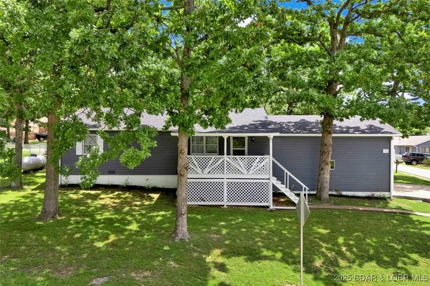 POTENTIAL TO SAVE $-OWNER FINANCING AVAILABLE W/APPROVAL OF CONDITIONS & ACEPTABLE TERMS. Impeccably maintained home w/LOW annual assessments! Offering an exceptional alternative compared to purchasing a 3 bedroom condo! Refined updates to include brand new HVAC (2025), roof (2024) & washer/dryer (2023). This pristine main level living home exudes quality &  care throughout while blending comfort & value! With a crisp clean interior, nice size rooms, tons of curb appeal, privacy fenced area, an attached garage, city sewer & a 10x24 slip in the community dock-it doesn't get any better! A covered inviting porch that allows you to relax and enjoy the lake lifestyle. Outdoor storage shed provides ample space for everything from landscaping tools to all your lake essentials. The remarkably low annual assessments proves this to be a rare smarter long term investment opportunity. A family-orientated neighborhood complete w/a community pool for summer fun & a playground designed for outdoor enjoyment. Blending comfort and value-whether this is a full time, part time residence or as a vacation rental this is ideal package without the high assessments. Start living the lake lifestyle today!